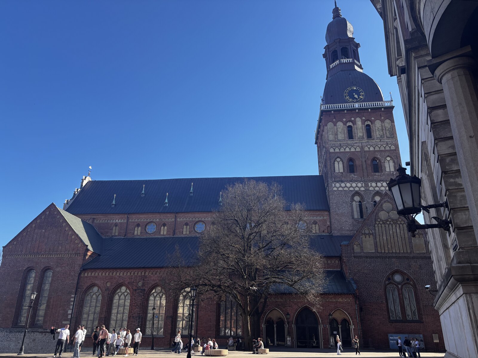 Riga Cathedral tower above Dome Square against a clear sky